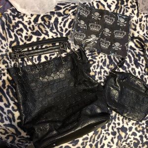New black skull purse